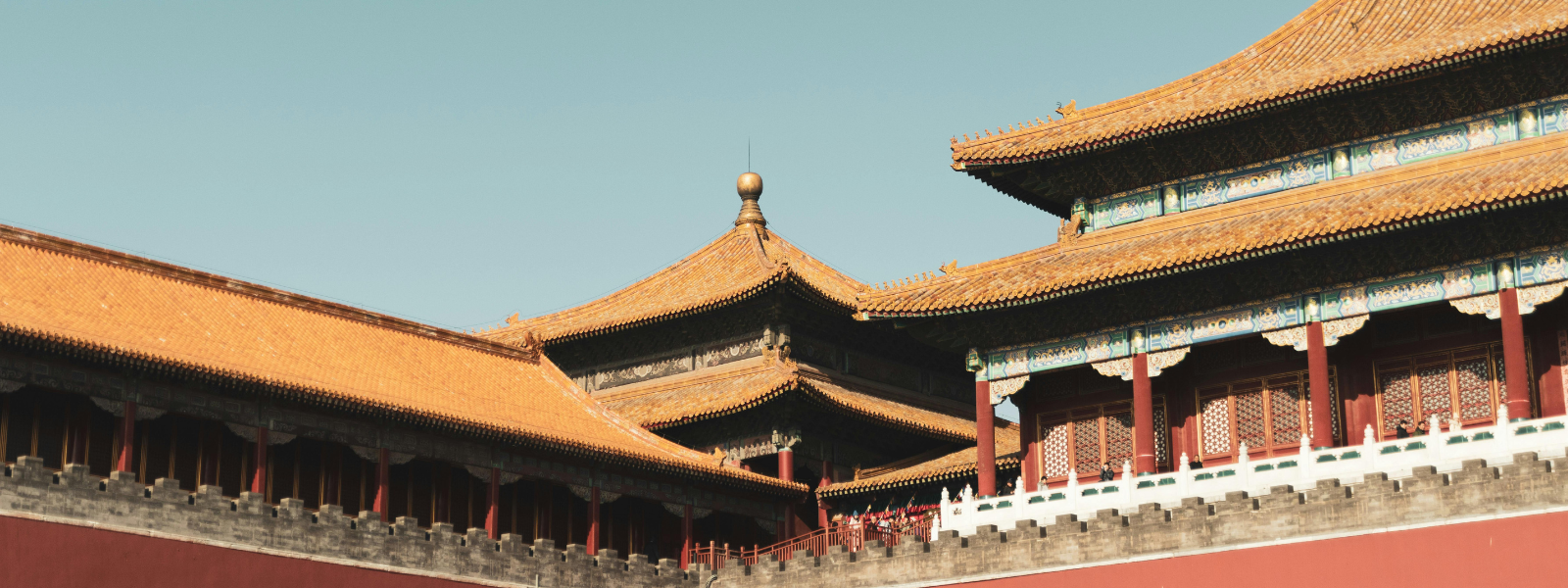Historic palace buildings in Beijing, China, with golden rooftops and red walls — a classic view for travelers preparing for a China visa.